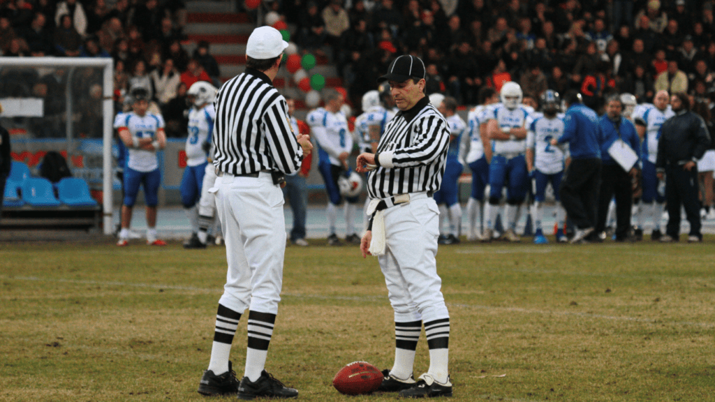 Two referees standing