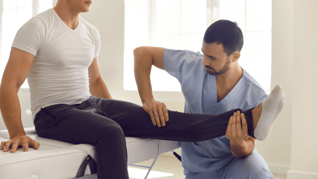 doctor examining young sportsman