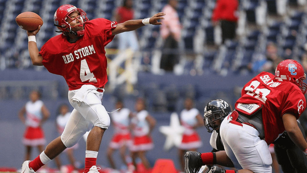 Football player about to pass the ball