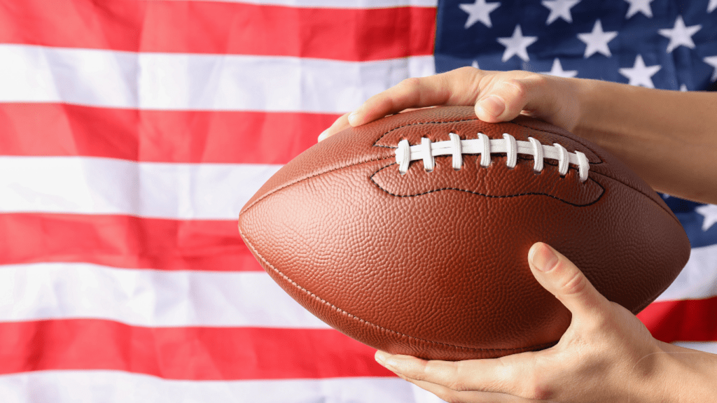american flag with football