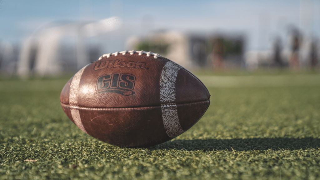 brown football in the field