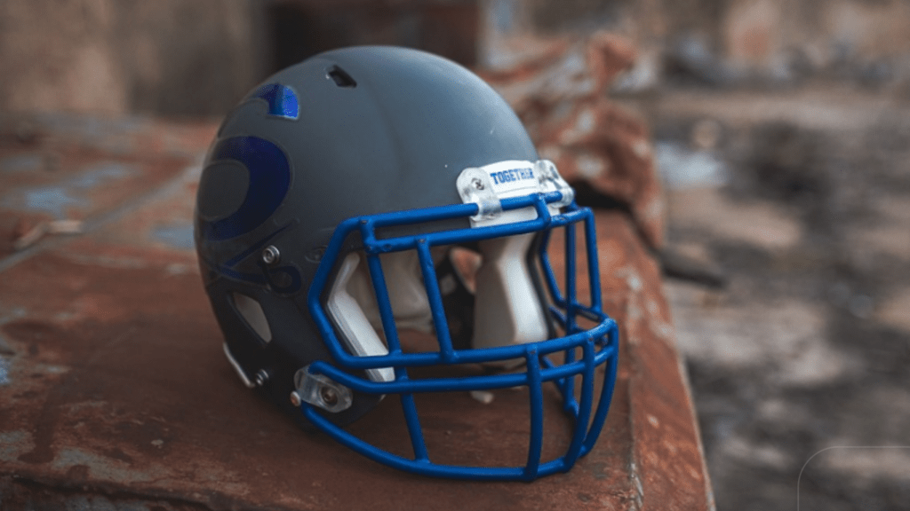 football helmet in rusty surface