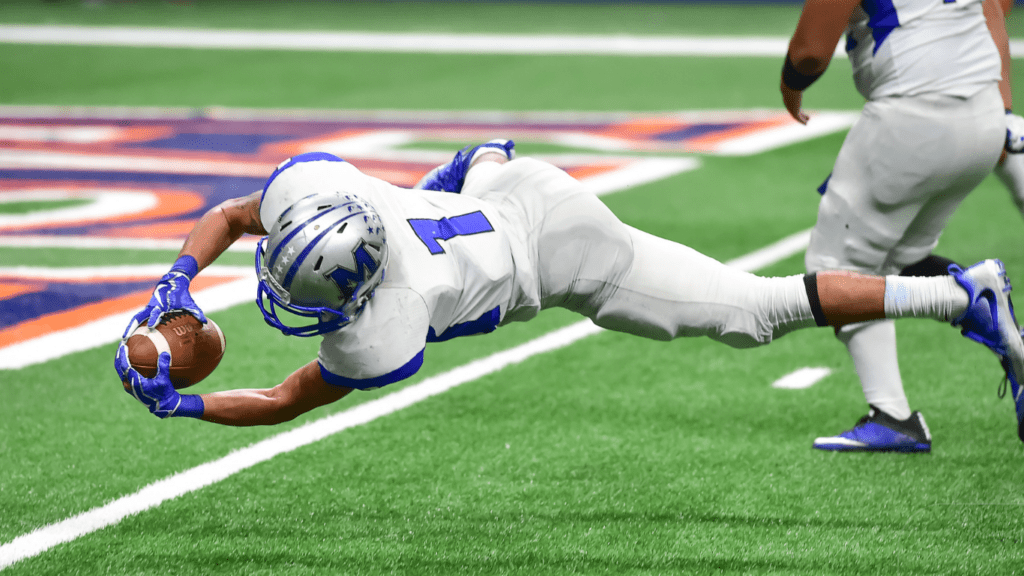 football player securing a goal