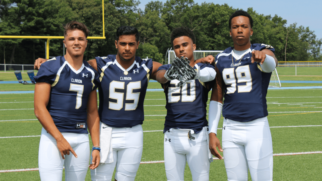 four football players