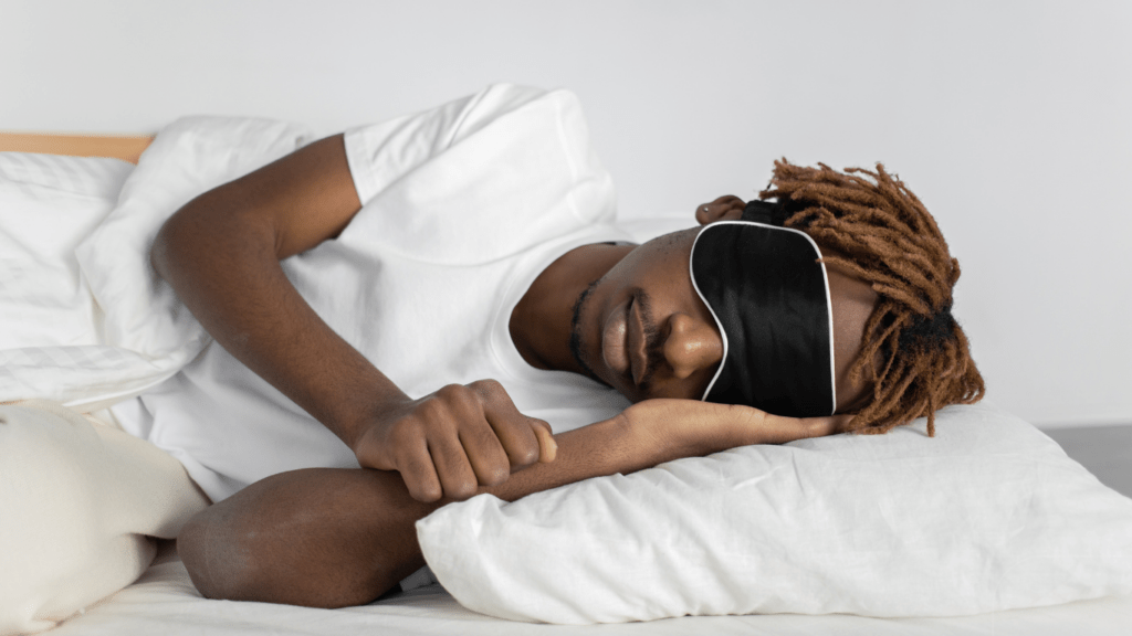 man sleeping with a mask