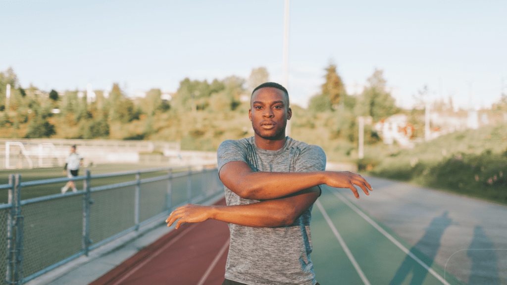 man warming up in the field