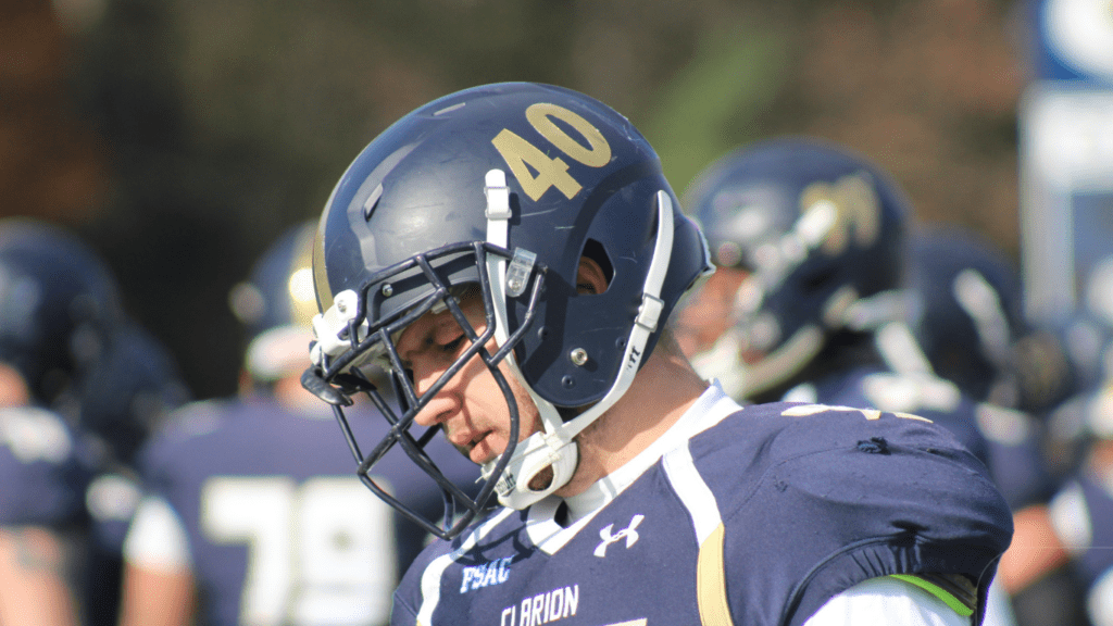 man wearing nfl helmet