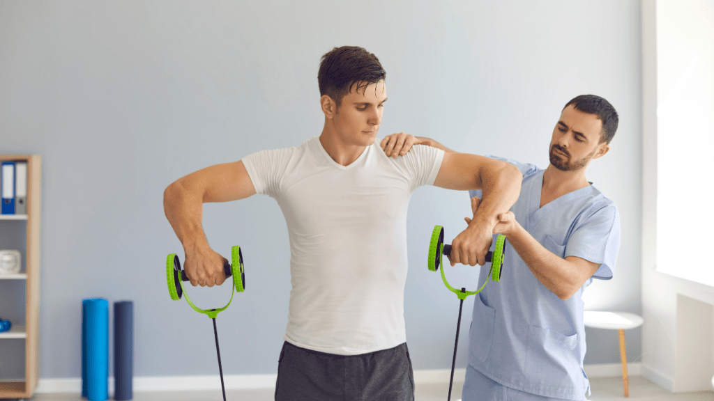 physiotherapist helping a sports man