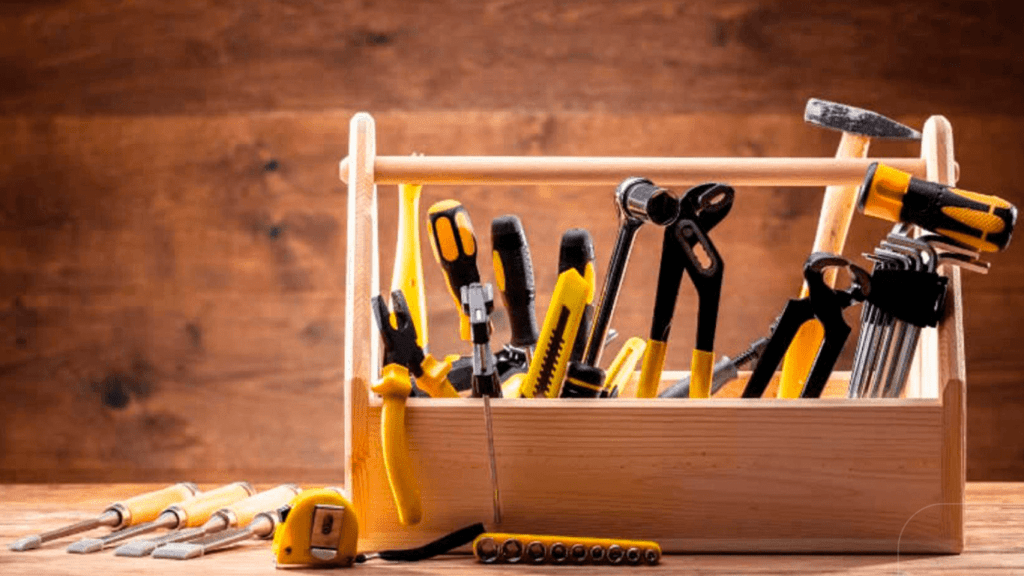 set of tools in wooden container